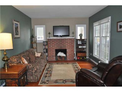 Exterior Front Living room with fireplace and side