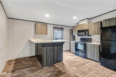 Kitchen featuring light hardwood / wood-style floo