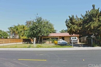 fully fenced yard with driveway.  street is newly 
