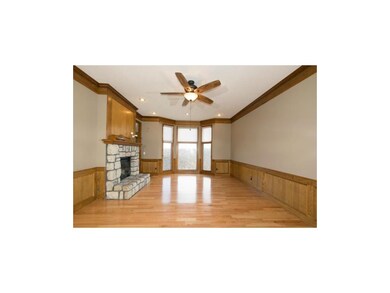 Family room with scenic views and custom shades.  