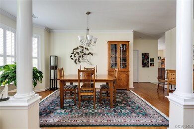 Dining Room features Laminate Floors, Crown Moldin