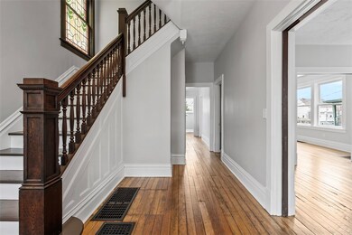 Entry with original stain glass window