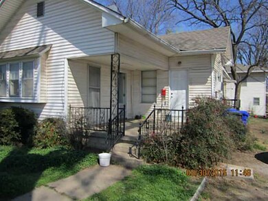 Exterior Front. 118  1/2 Apache back house