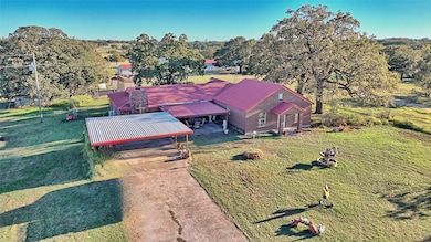 295 Feed Store Rd, Bowie, TX 76230 - photo 2