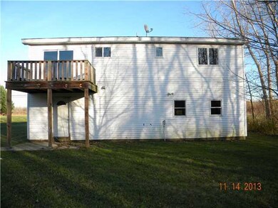 Exterior Back. Back view of the dwelling.