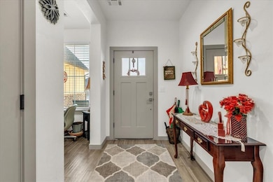 Entryway featuring light hardwood / wood-style flo