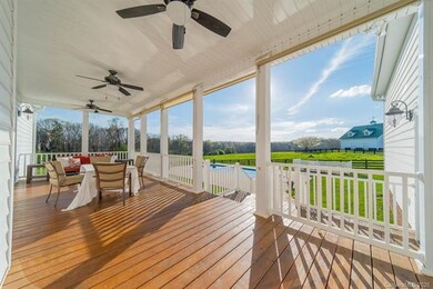 Charming covered back porch with amazing views