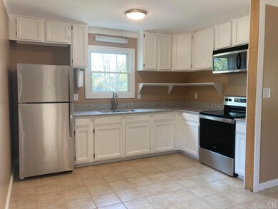 Kitchen with quartz countertops and new appliances
