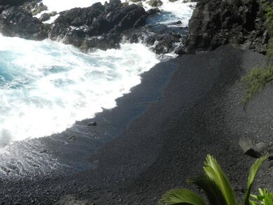 World famous Kehena Black Sand Beach is about one mile distant.