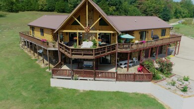 Wrap around deck with upper and lower seating areas to enjoy the outdoors 
