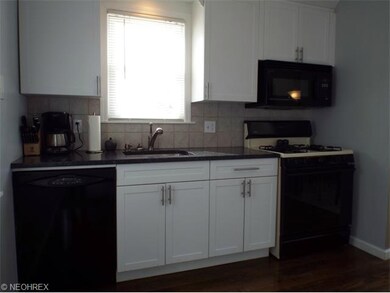 Light-filled kitchen offers plenty of storage spac