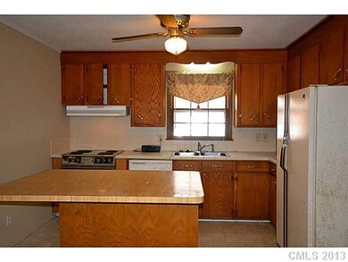 Kitchen - Kitchen includes appliances and center i