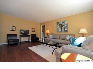 The den is spacious, lots of natural light.