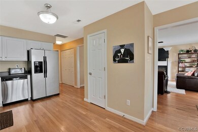 White Cabinets and Stainless Steel Dishwasher and