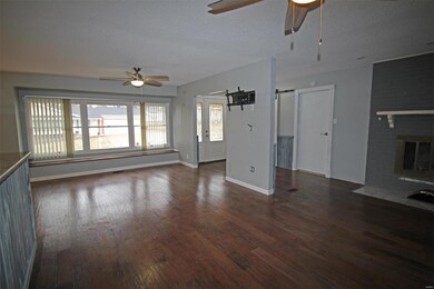 Large open great room with plenty of windows