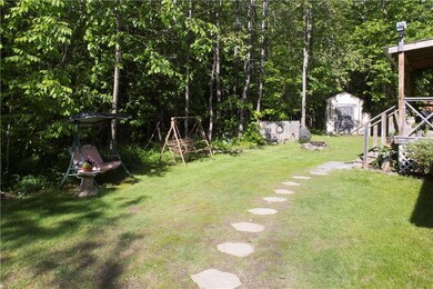 Well landscaped + 2 sheds