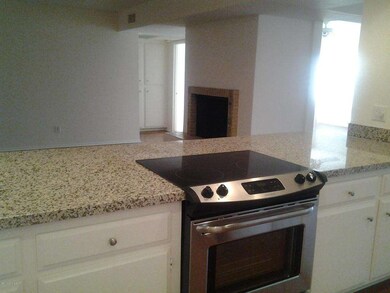 Kitchen Opens to Family Room w/Fireplace