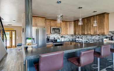 Kitchen featuring appliances with stainless steel