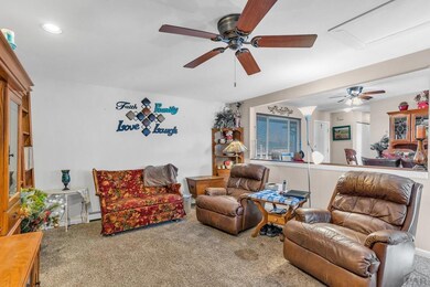 Ample room in family room with view of dining room