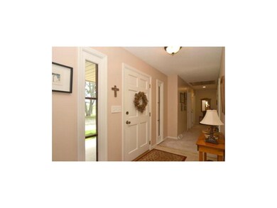 Entry open to both formal dining and great room.