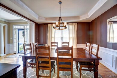Note the beautiful moldings and tray ceiling!