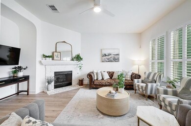 Living area featuring wood finished floors, ceili