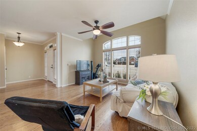 Formal living room with large windows overlooking