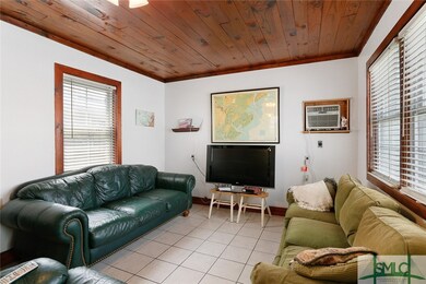 large living room room with heartpine ceiling