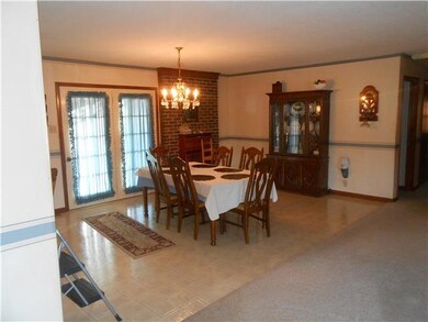 Adjoining dining room offers plenty of room for entertaining.