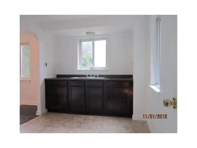 Kitchen. New kitchen cabinets, sink and ceramic tile.