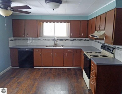 New backsplash, laminate flooring, sink faucet and