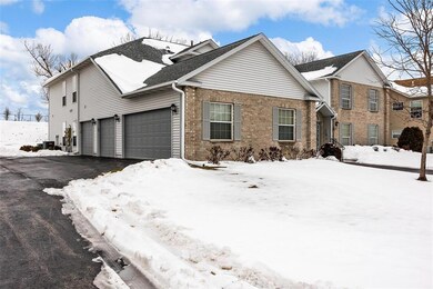 This condo has a 1 car attached garage located off