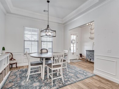 Dining area with a wealth of natural light, an inv