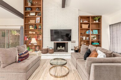 Bookcases as tall as the vaulted ceiling
