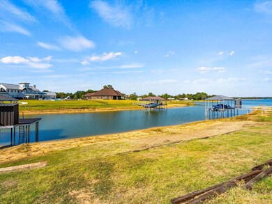 Water view with a dock