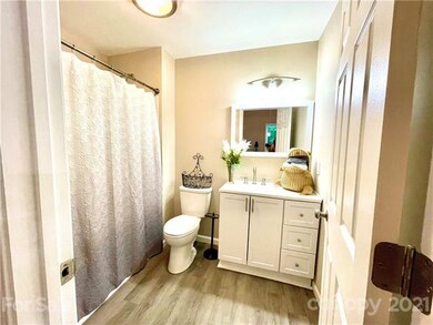 Second full bath with tub.