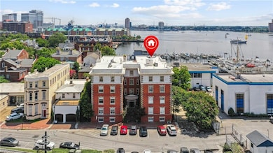 Historic Building overlooking water.