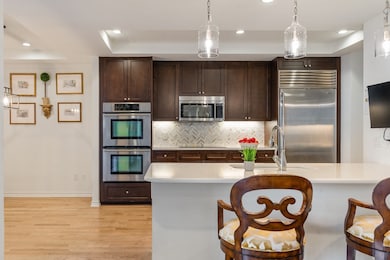 Kitchen with large peninsula island seating