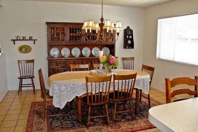 Large, lovely dining room with lots of natural lig