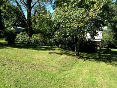 Yard/Garden. Private, tree-lined backyard with ple
