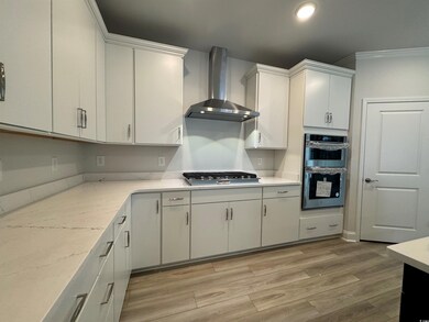 Kitchen with appliances with stainless steel finis