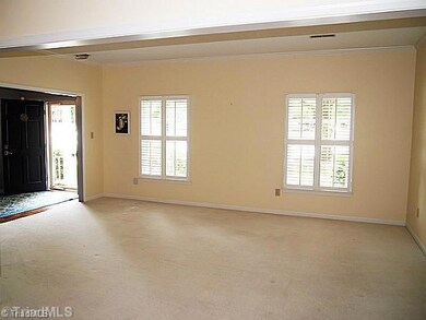 Living Room. Spacious living room with neutral decor - perfect for entertaining or family gatherings.