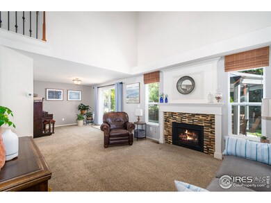 Living room with vaulted ceilings.