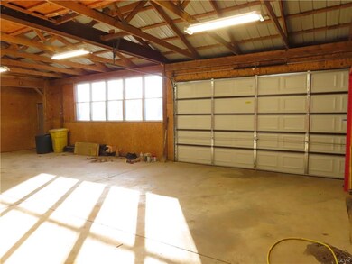 Center shop with double doors and many large stora