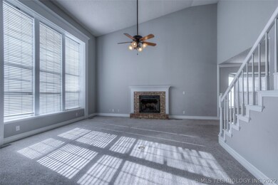 Formal living room with fireplace. Look at the bea
