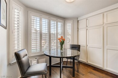 Quaint breakfast nook with views of the pool area