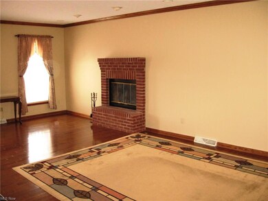 Huge sunken Family room with hardwood flooring and