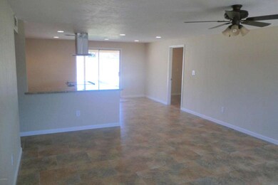 Living room looking back at kitchen