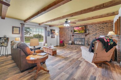 Cozy Living area with Beautiful Beam Ceiling and F