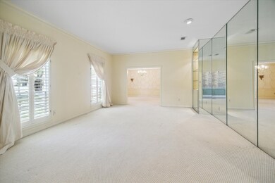 The 9' ceilings make the Formal Living Room feel e